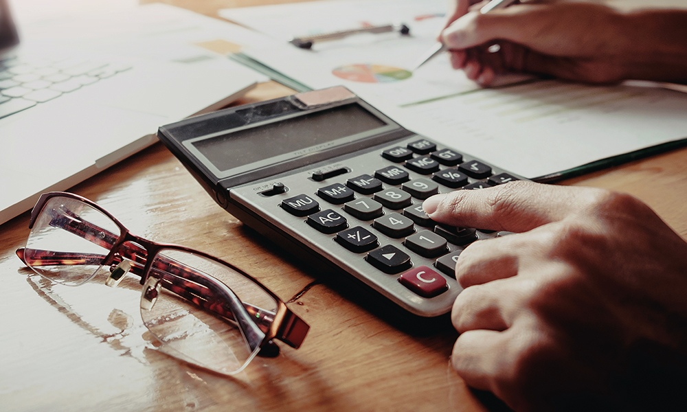 Accountant Using a Calculator